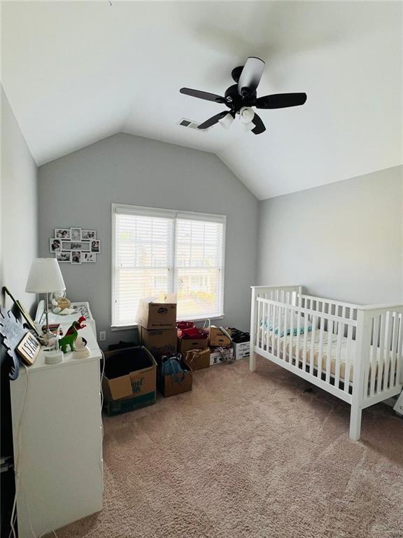 7437 Fireside Lane Flowery Branch, GA 30542 - Photo 16 of 16 a bed room with furniture and a window