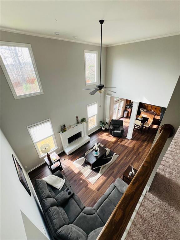 7437 Fireside Lane Flowery Branch, GA 30542 - Photo 5 of 16 a living room with furniture and a window