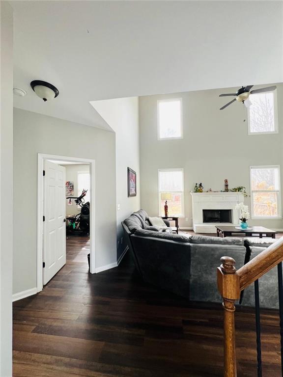 7437 Fireside Lane Flowery Branch, GA 30542 - Photo 7 of 16 a kitchen view with wooden floor and stainless steel appliances
