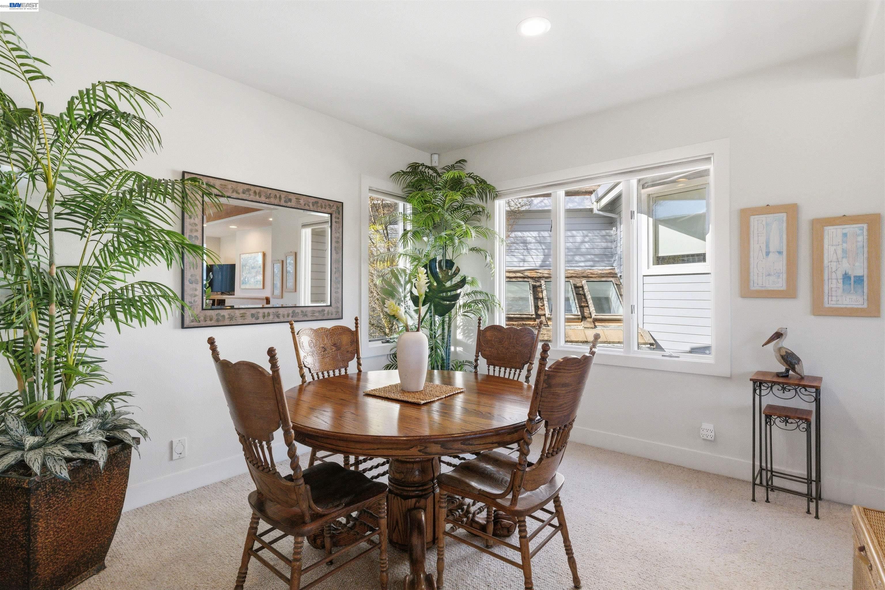 126 Frederick Street Santa Cruz, CA 95062 - Photo 11 of 60 a view of a dining room with furniture and window