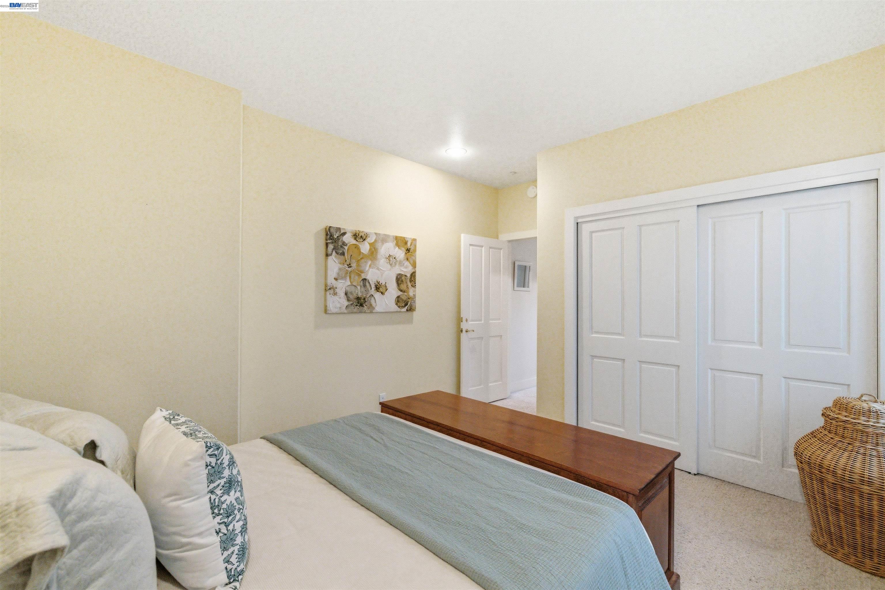126 Frederick Street Santa Cruz, CA 95062 - Photo 15 of 60 a bedroom with a bed and furniture