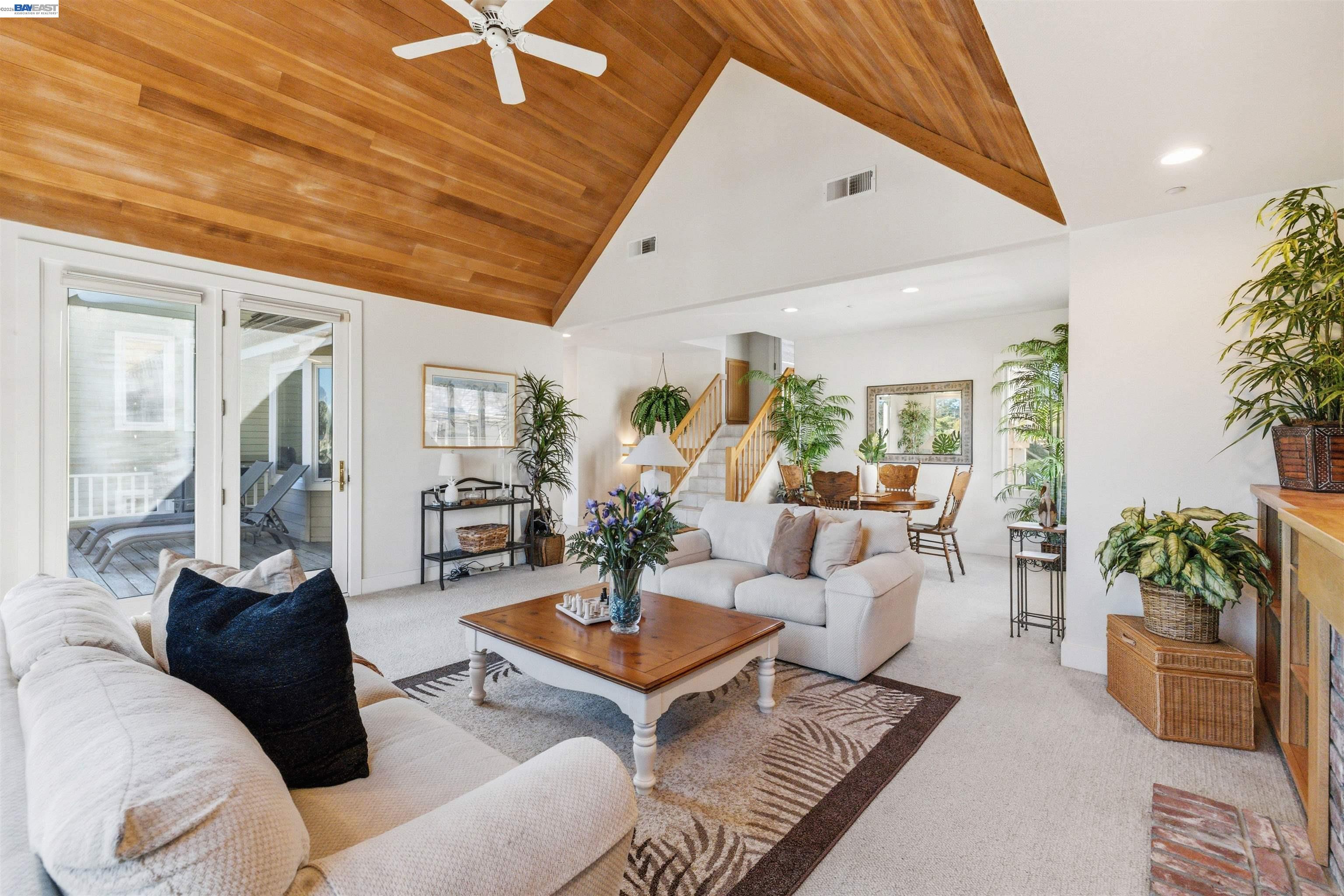 126 Frederick Street Santa Cruz, CA 95062 - Photo 4 of 60 a living room with furniture a chandelier