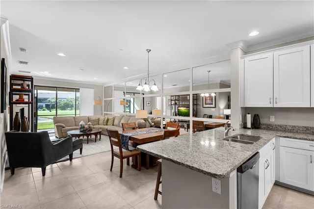a kitchen with counter space cabinets and appliances