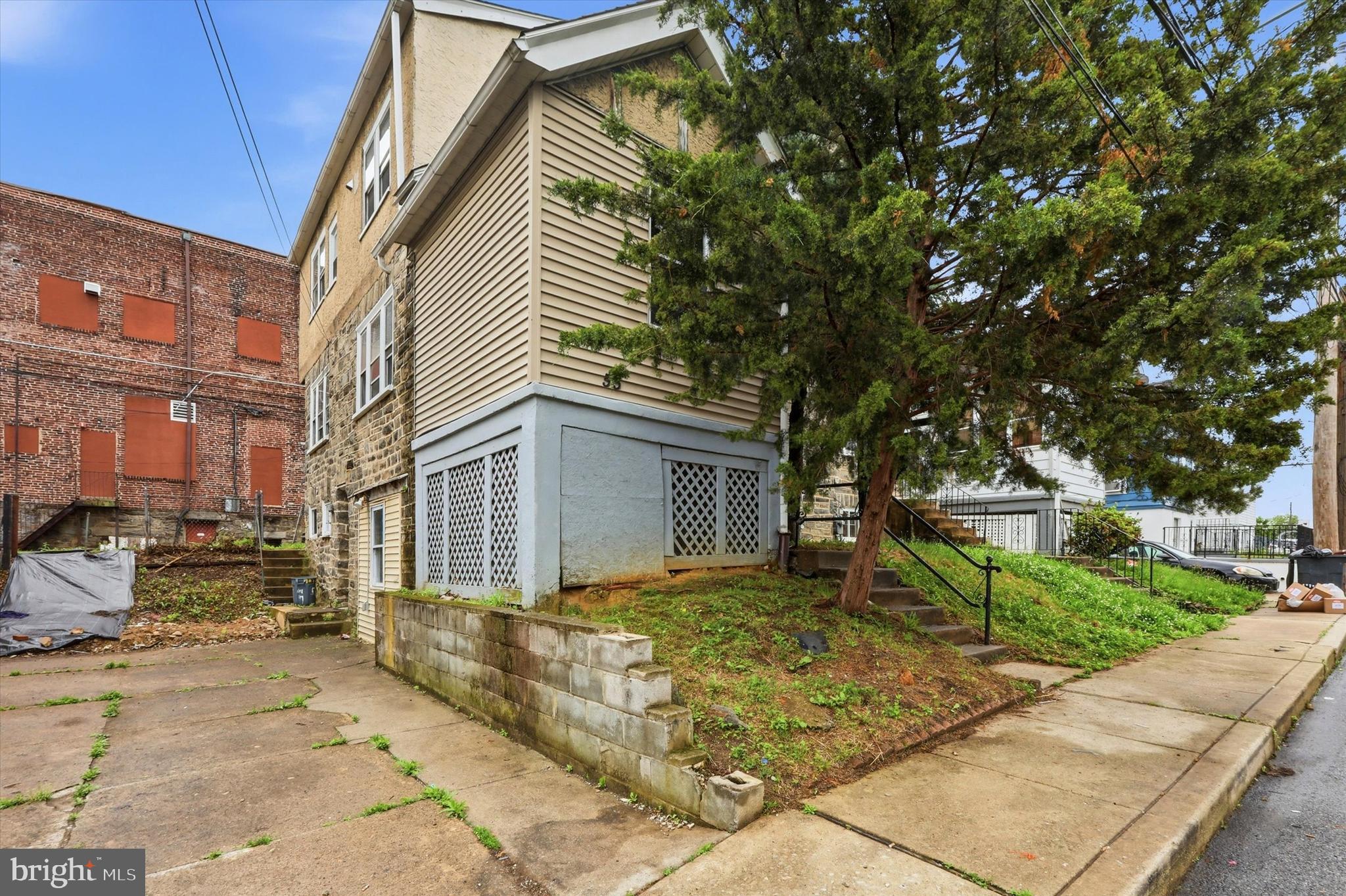 55 Richfield Road Upper Darby, PA 19082 - Photo 2 of 33 a view of a house with a patio