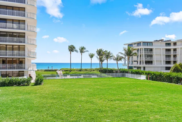 a view of a building with a yard