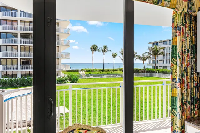 a view of a balcony with lake view