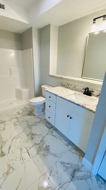 2 Touraine Street Worcester, MA 01604 - Photo 11 of 34 a bathroom with a granite countertop sink a toilet and a tub