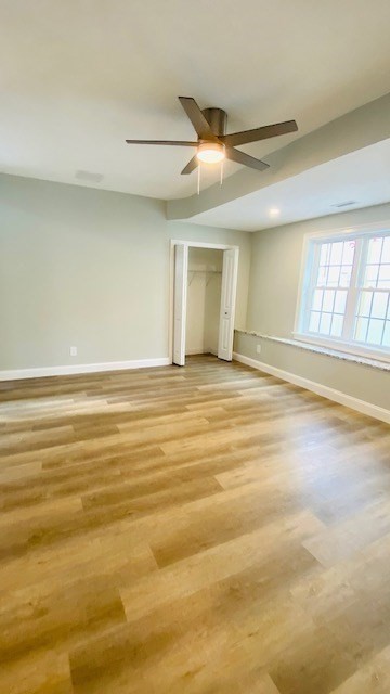 2 Touraine Street Worcester, MA 01604 - Photo 12 of 34 a view of an empty room with window and wooden floor