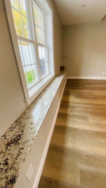 2 Touraine Street Worcester, MA 01604 - Photo 26 of 34 a view of an empty room and wooden floor