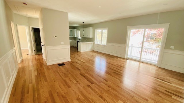 2 Touraine Street Worcester, MA 01604 - Photo 5 of 34 a view of a living room hardwood floor and a kitchen