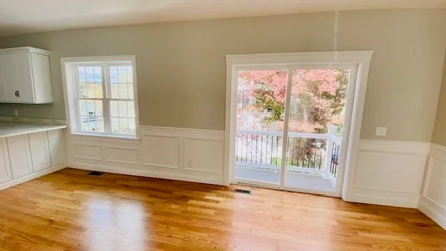 a view of an empty room and window