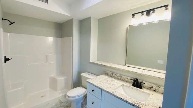2 Touraine Street Worcester, MA 01604 - Photo 10 of 34 a bathroom with a granite countertop sink toilet and shower