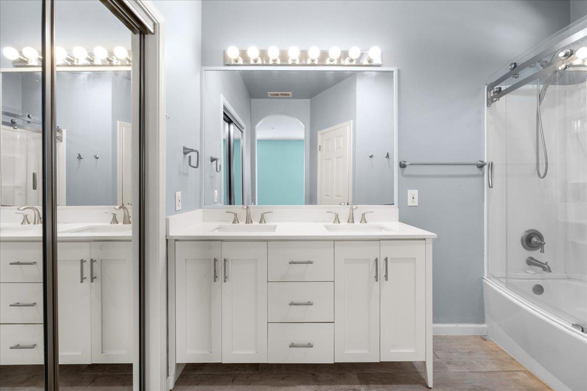 478 Churchill Way Salinas, CA 93906 - Photo 15 of 31 a bathroom with a double vanity sink mirror and bathtub