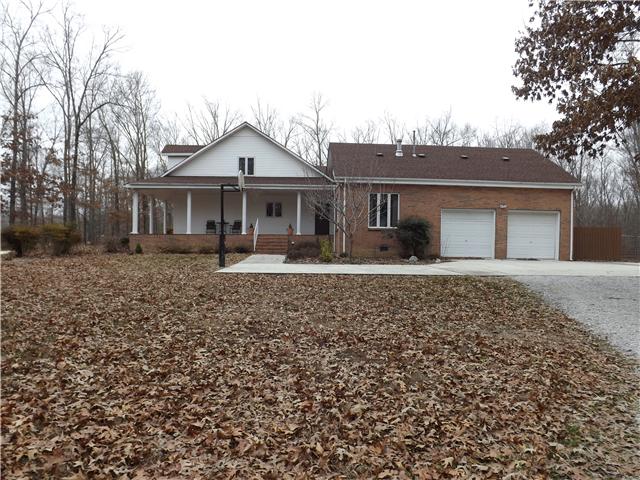 263 Bentridge Road Manchester, TN 37355 - Photo 2 of 6 This great home features a wraparound porch, oversized double garage and concrete pad with basketball goal.