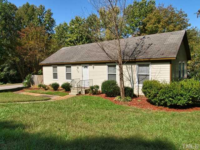 308 Sawmill Road Raleigh, NC 27615 - Photo 13 of 15 a view of a house with yard and sitting area