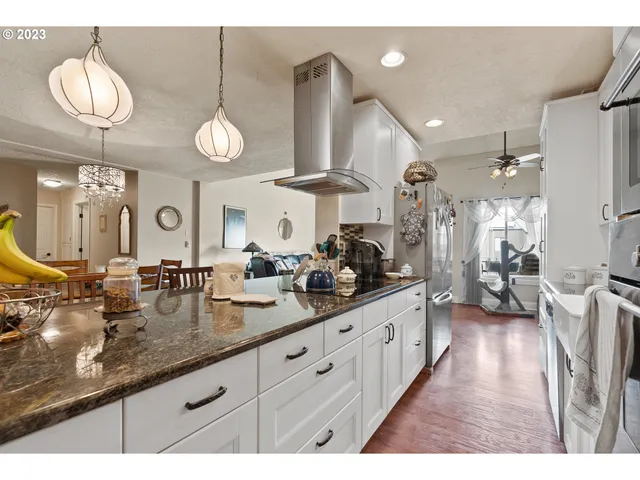 a kitchen with lots of counter space and a sink