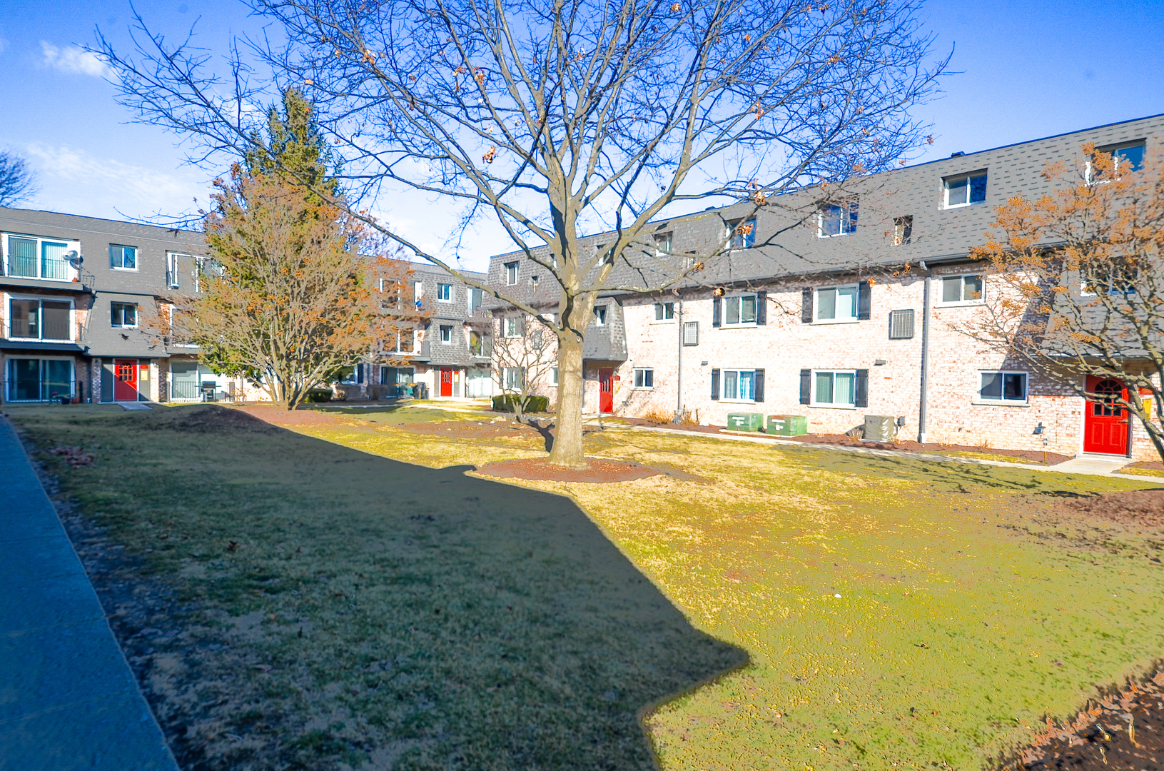 876 South Plum Grove Road, Unit 208 Palatine, IL 60067 - Photo 14 of 14 a swimming pool with outdoor seating and yard