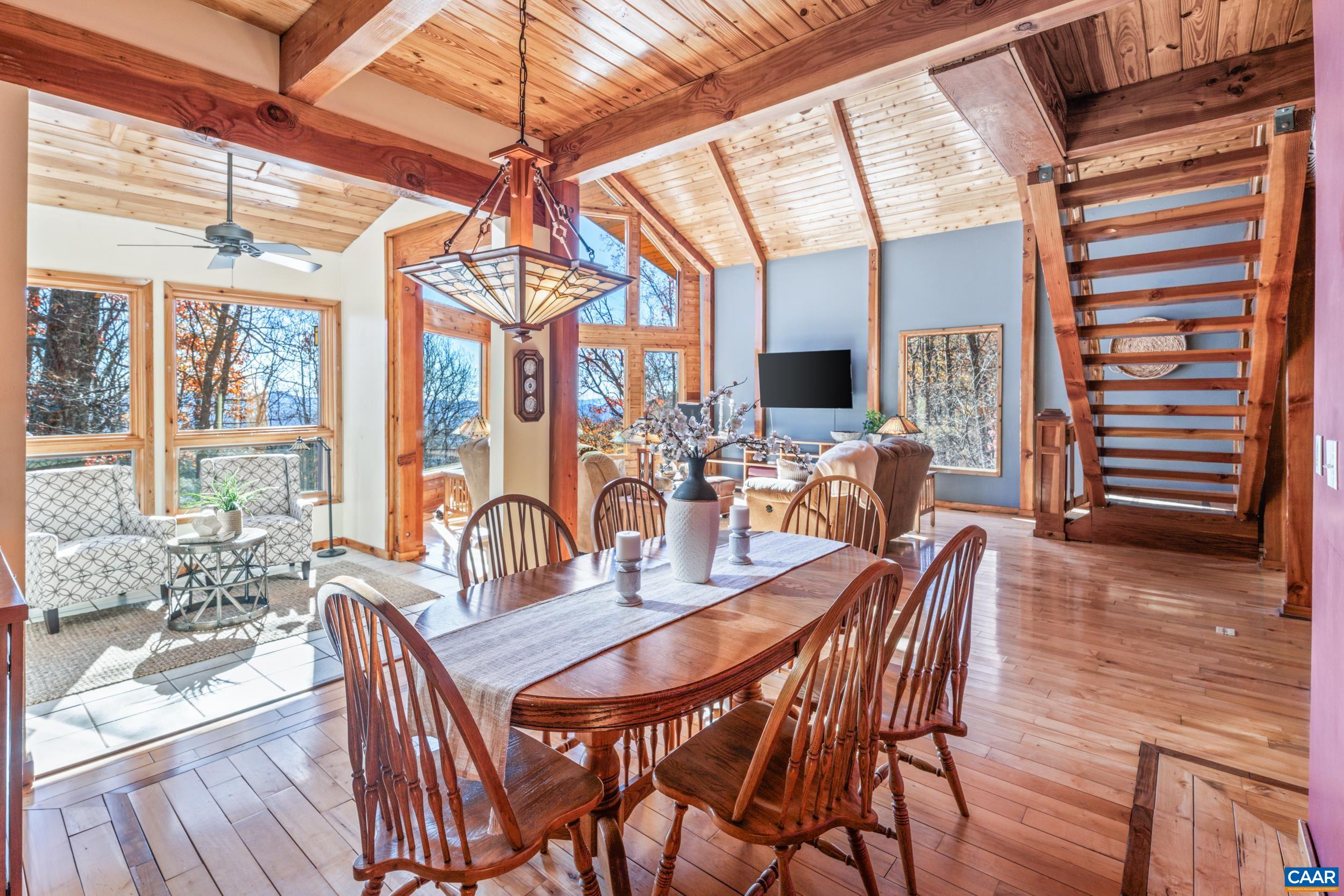 6696 Highlander Way Crozet, VA 22932 - Photo 71 of 71 a dining room with furniture window wooden floor