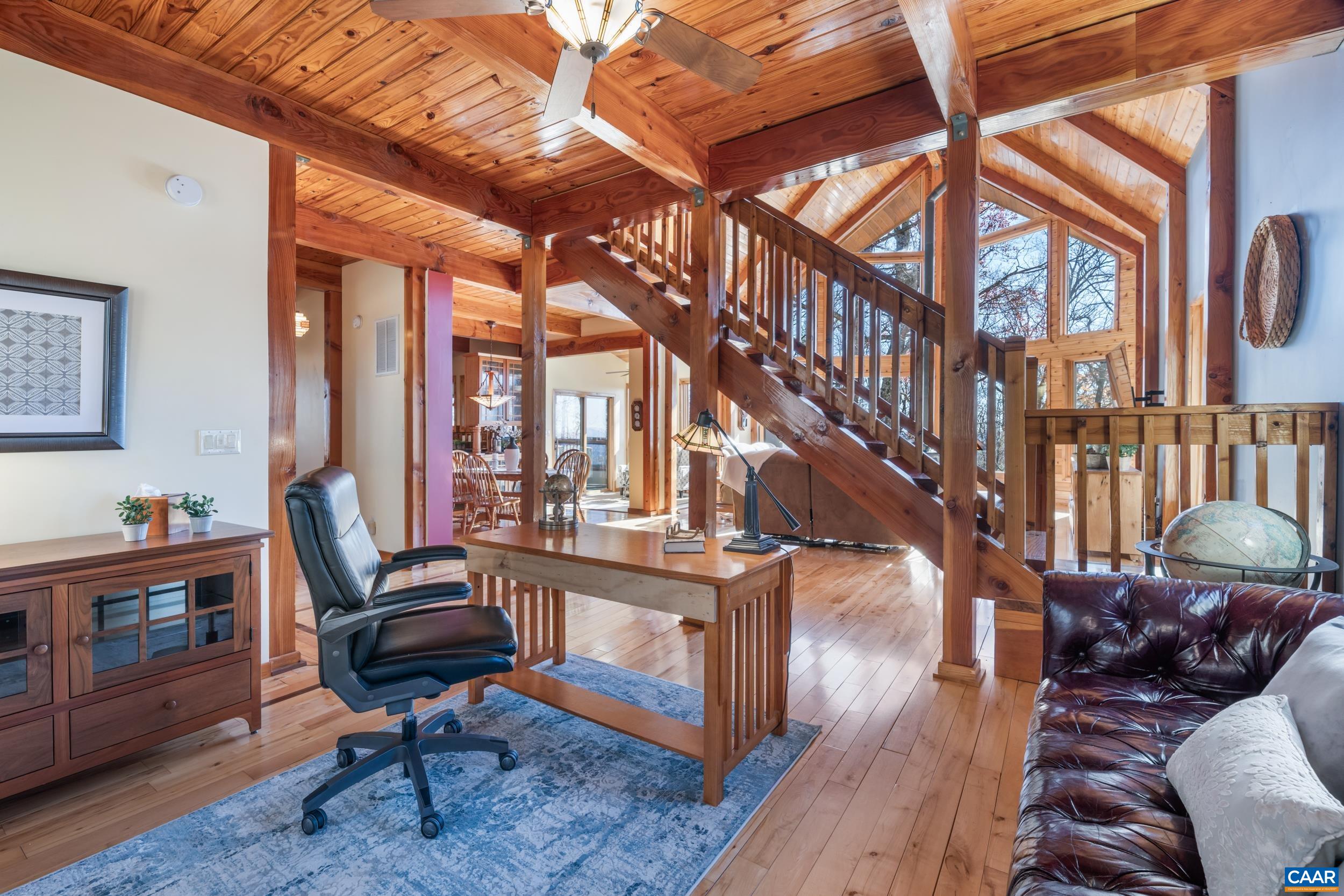 6696 Highlander Way Crozet, VA 22932 - Photo 23 of 71 a view of living room filled with furniture and wooden floor