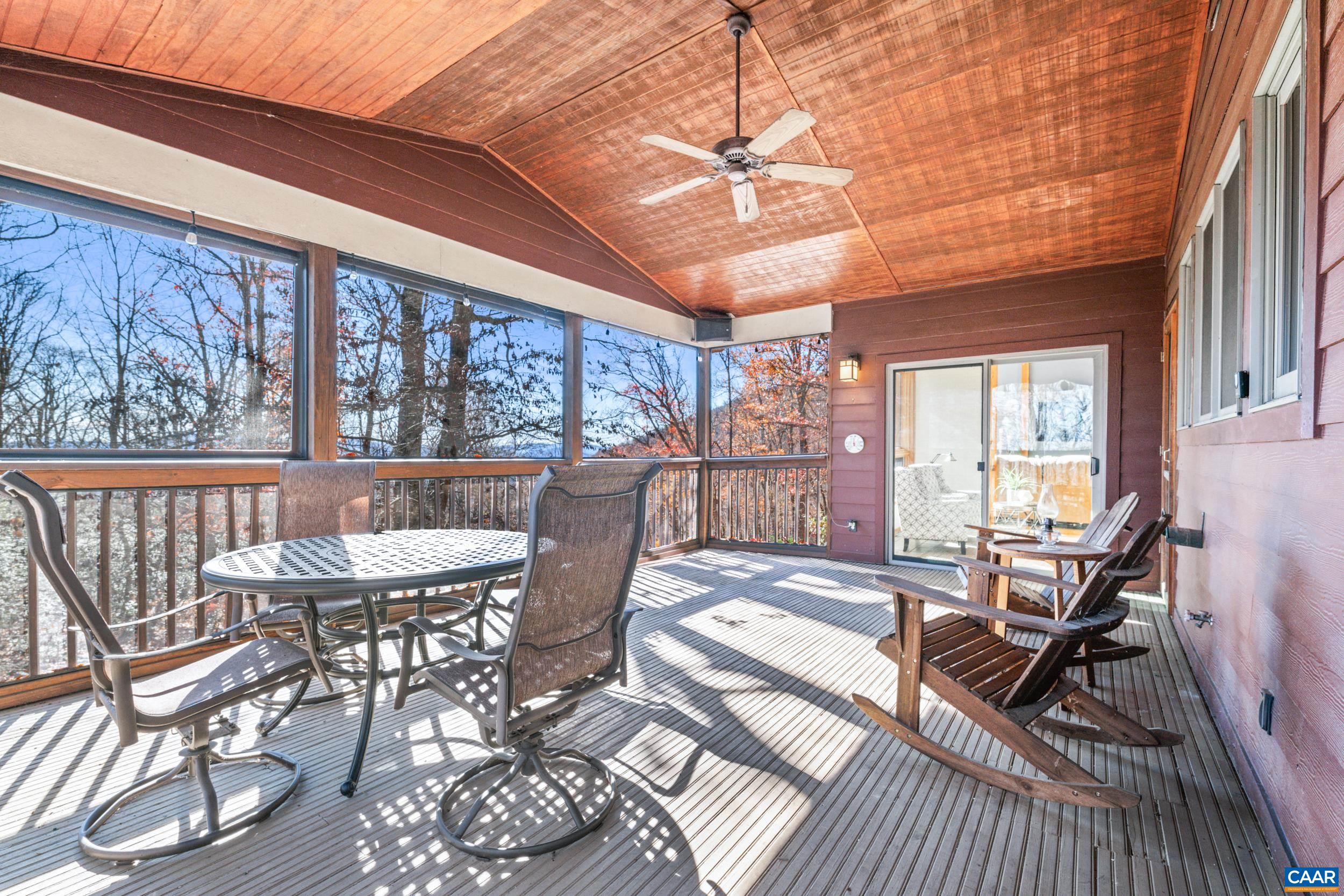 6696 Highlander Way Crozet, VA 22932 - Photo 25 of 71 a view of a dining room with furniture window and outside view