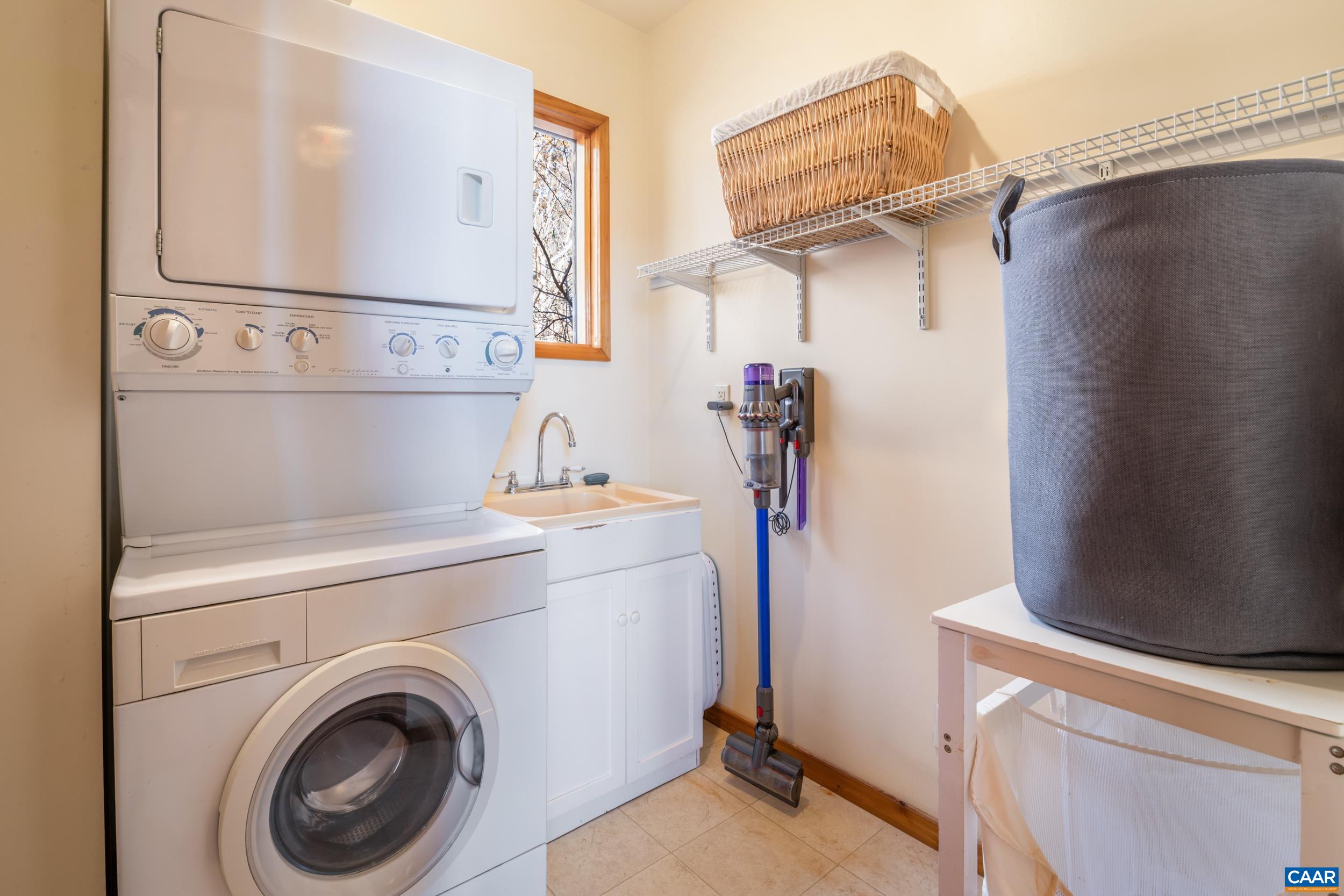 6696 Highlander Way Crozet, VA 22932 - Photo 28 of 71 a view of storage and utility room with washer and dryer