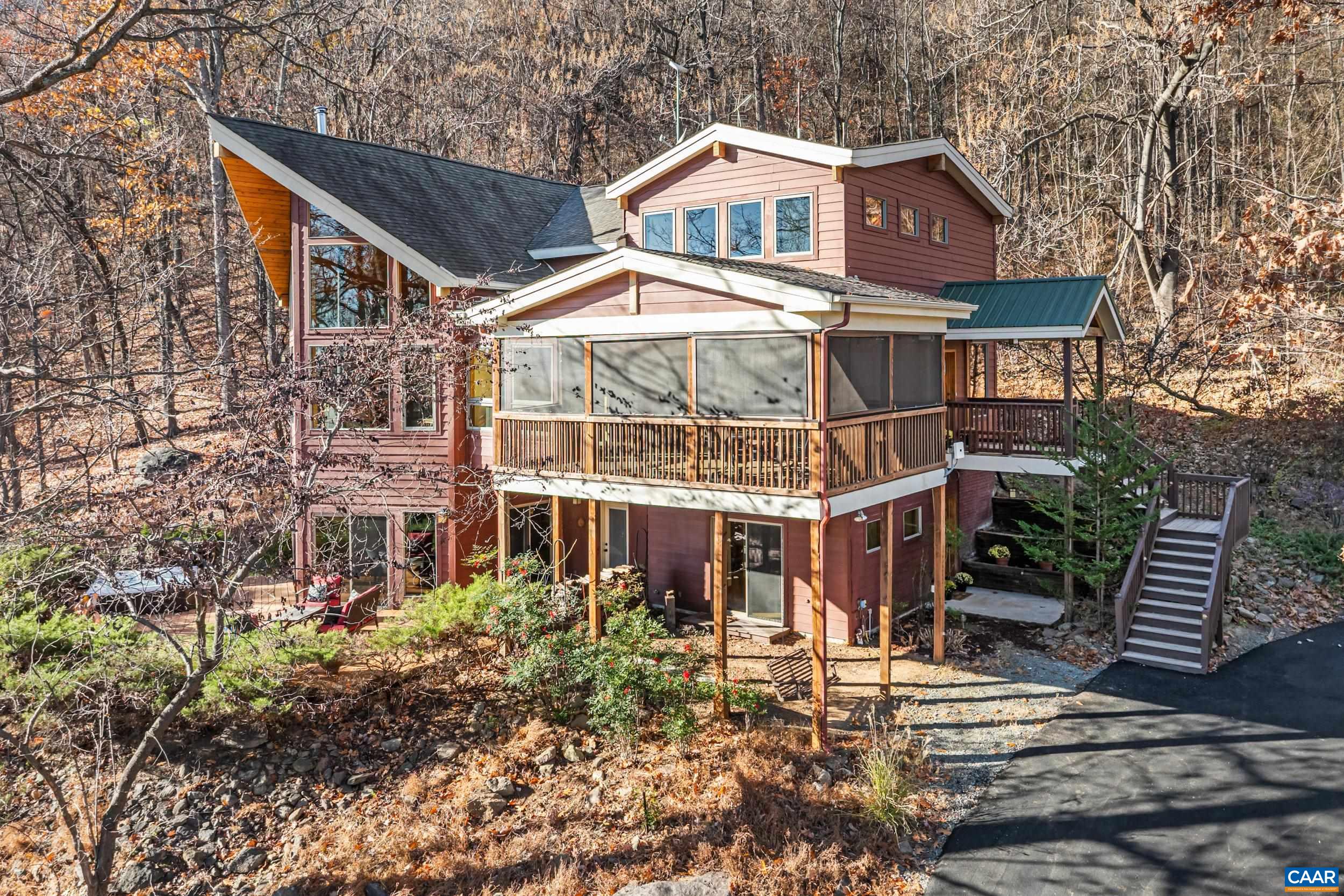 6696 Highlander Way Crozet, VA 22932 - Photo 3 of 71 a view of a house with yard and sitting area