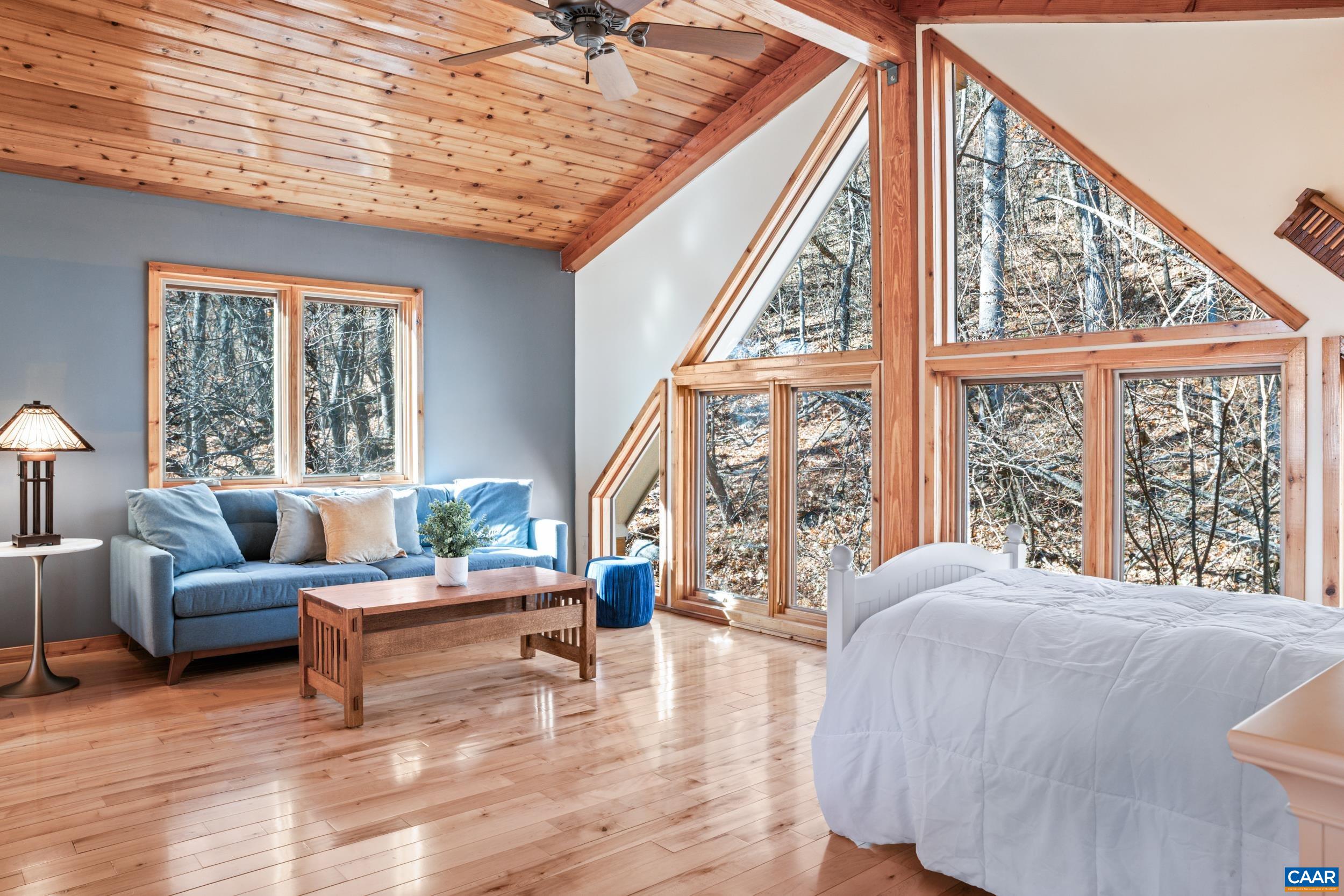 6696 Highlander Way Crozet, VA 22932 - Photo 31 of 71 a bedroom with furniture and large windows