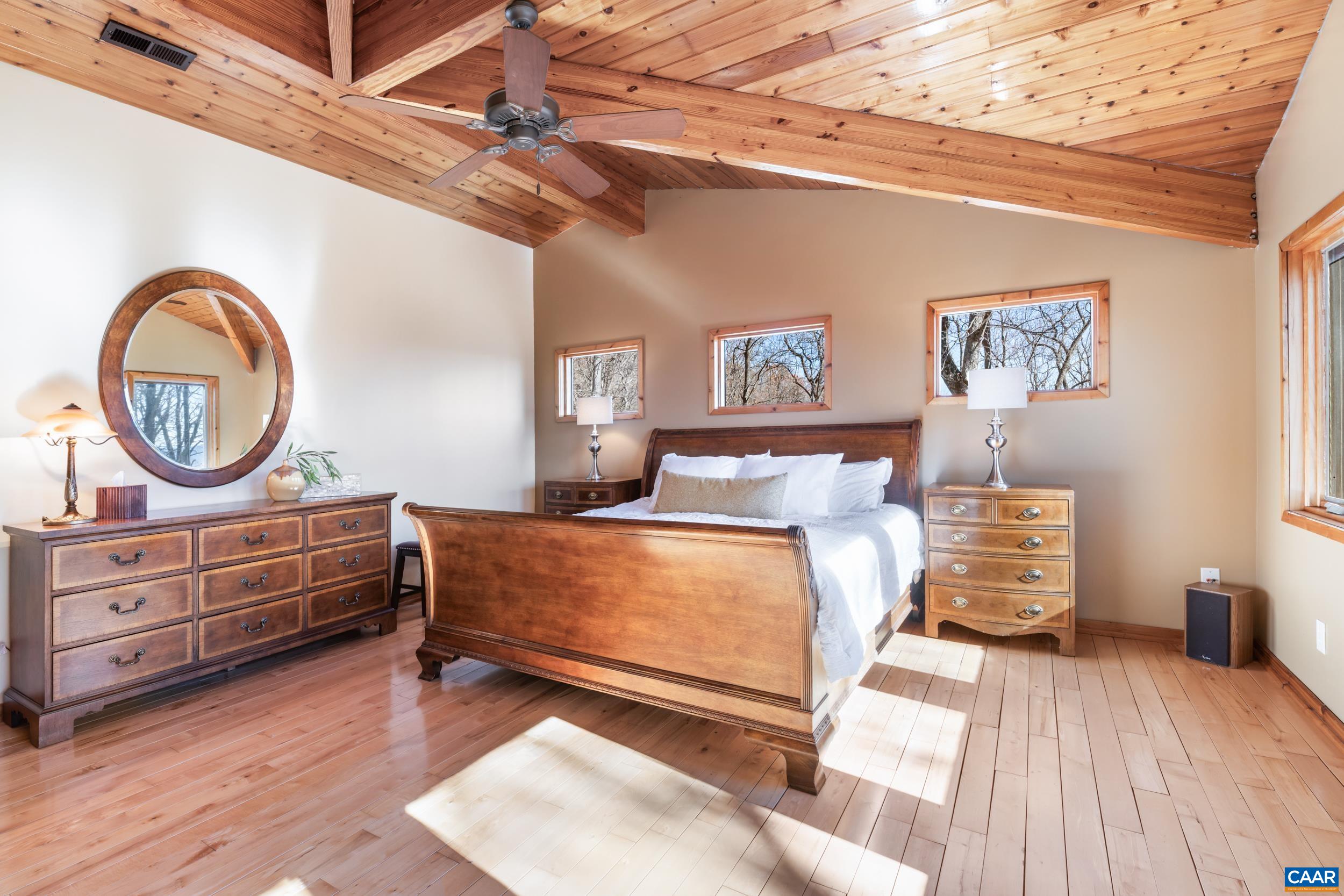 6696 Highlander Way Crozet, VA 22932 - Photo 37 of 71 a bed room with a bed and a dresser