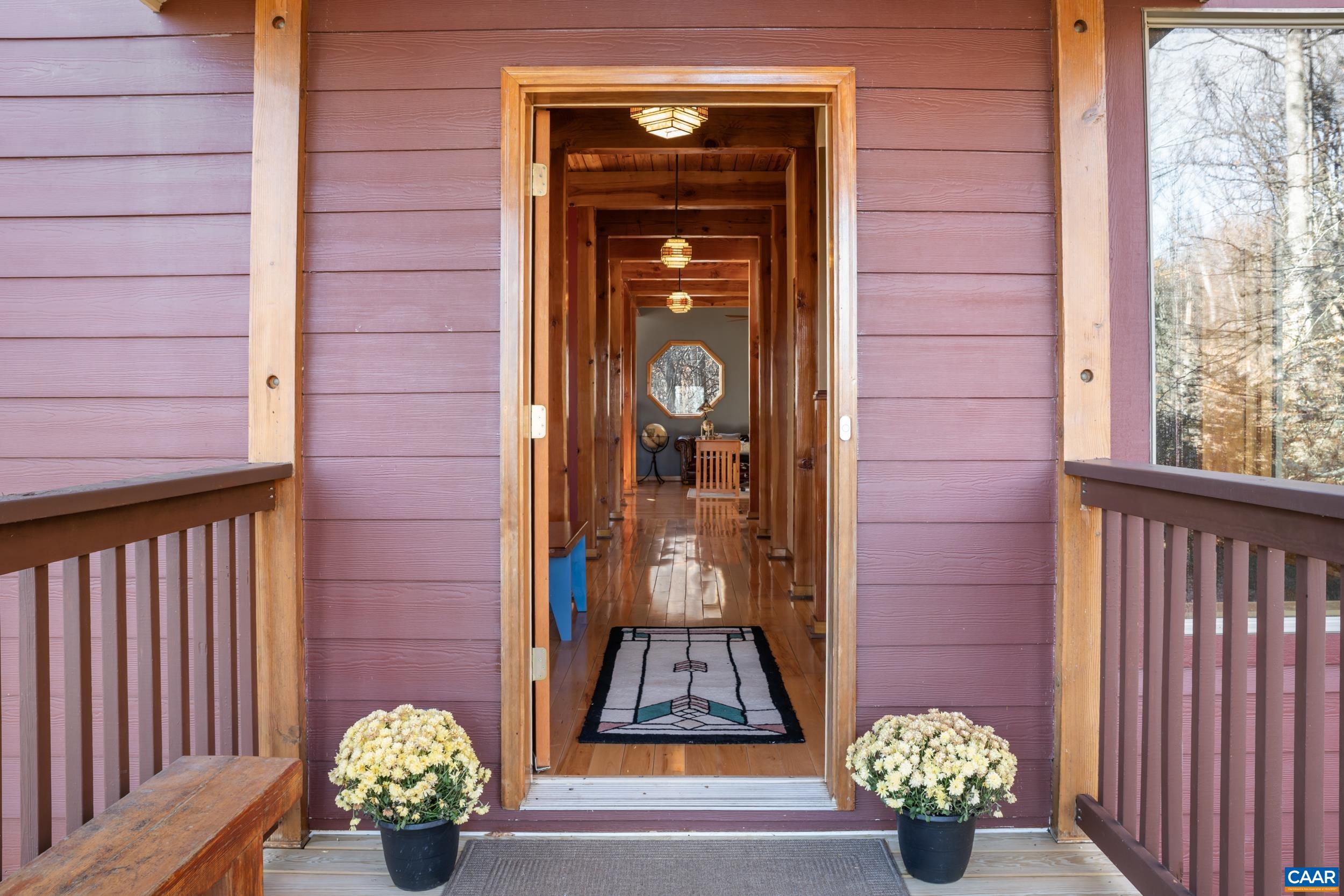 6696 Highlander Way Crozet, VA 22932 - Photo 4 of 71 a front view of a house with entryway