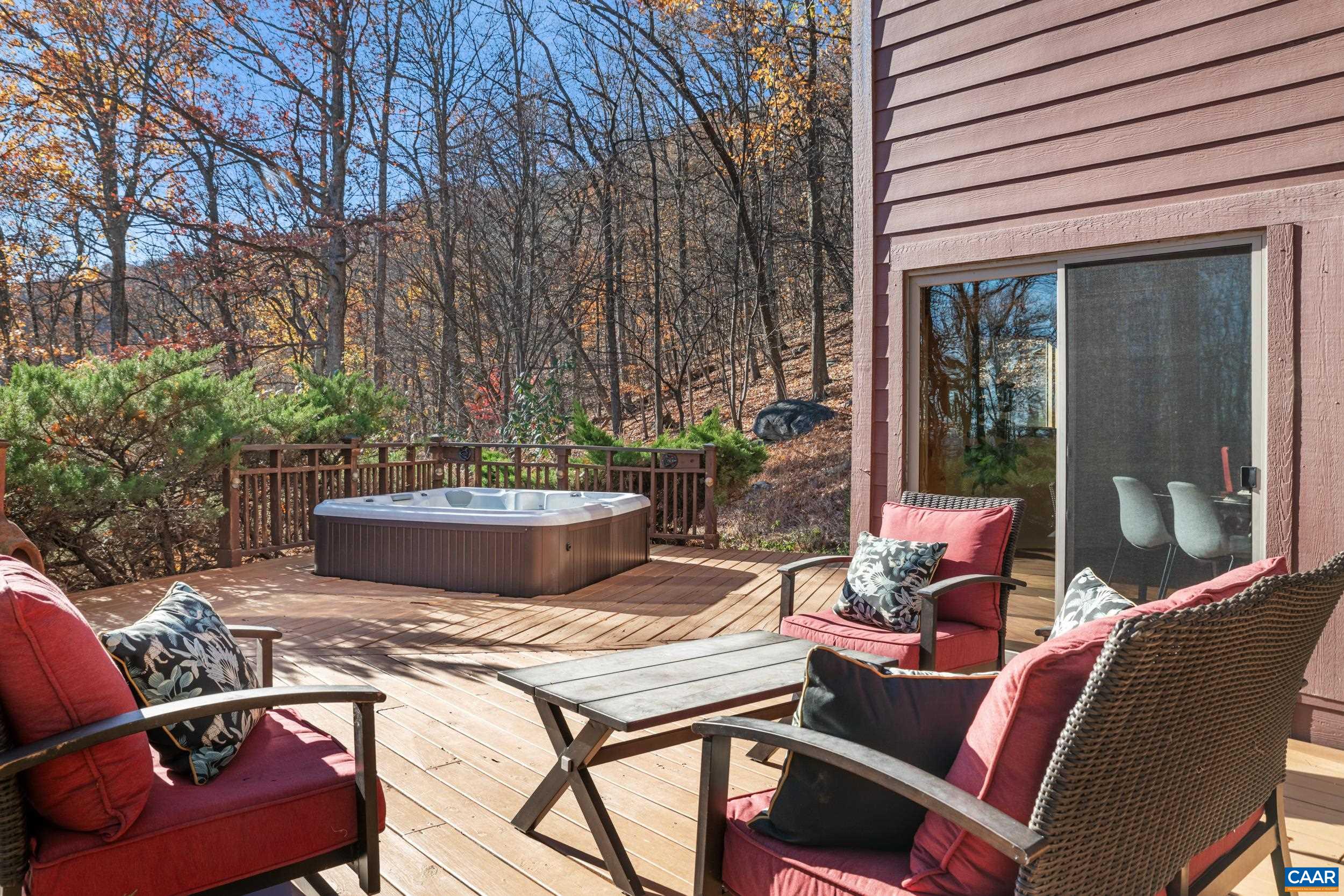 6696 Highlander Way Crozet, VA 22932 - Photo 58 of 71 a view of a patio with table and chairs and potted plants