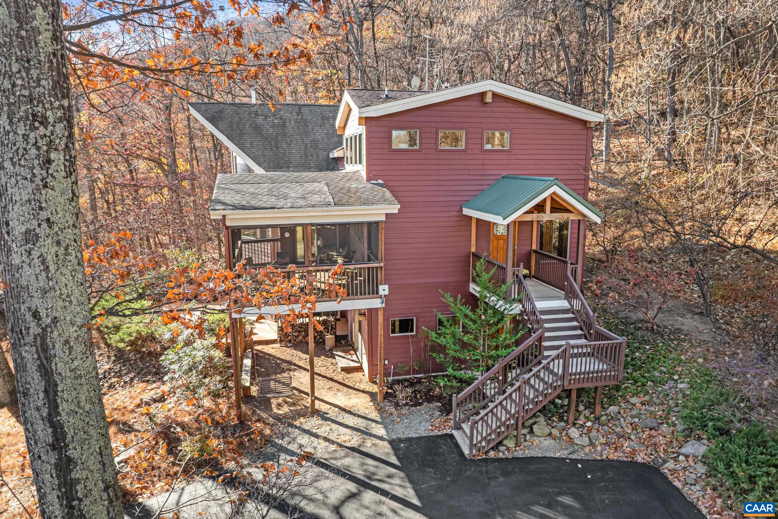 6696 Highlander Way Crozet, VA 22932 - Photo 65 of 71 a front view of a house with garden