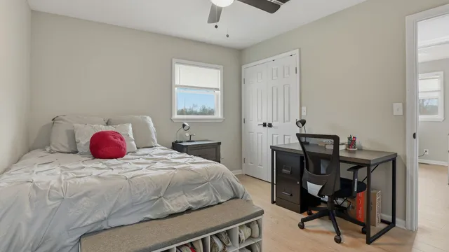 a bathroom with a mirror a sink and a mirror