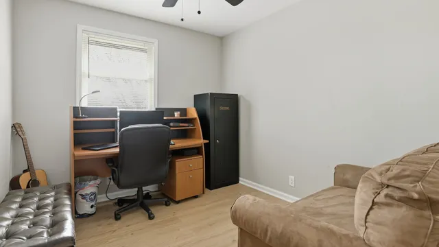 a room with furniture and cabinets
