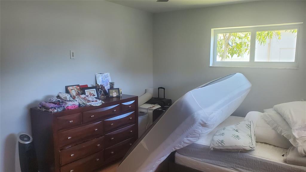 616 Southeast 8th Avenue Deerfield Beach, FL 33441 - Photo 18 of 38 a view of a workspace with furniture and a window