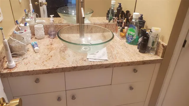 a bathroom with a toilet and shower