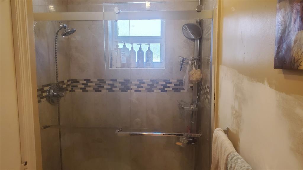 616 Southeast 8th Avenue Deerfield Beach, FL 33441 - Photo 28 of 38 a bathroom with a shower