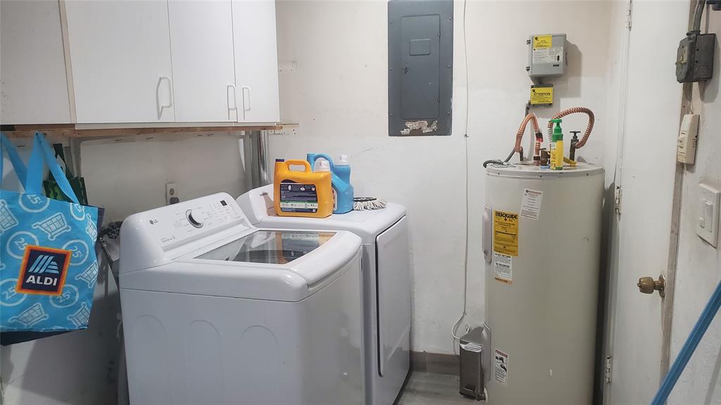 616 Southeast 8th Avenue Deerfield Beach, FL 33441 - Photo 29 of 38 a utility room with dryer and washer