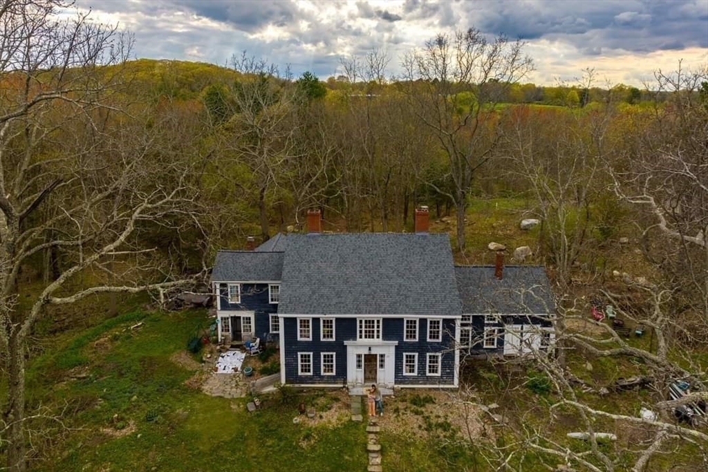 25 Bulkeley Road, Unit CENTER Littleton, MA 01460 - Photo 3 of 40 a view of a house with a yard