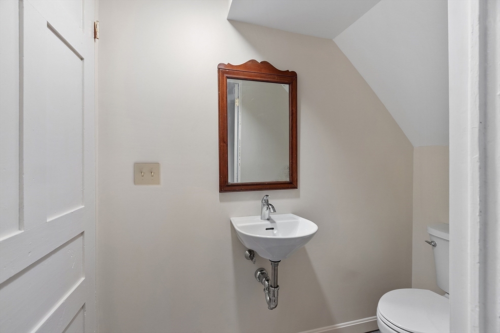 25 Bulkeley Road, Unit CENTER Littleton, MA 01460 - Photo 37 of 40 a bathroom with a sink toilet