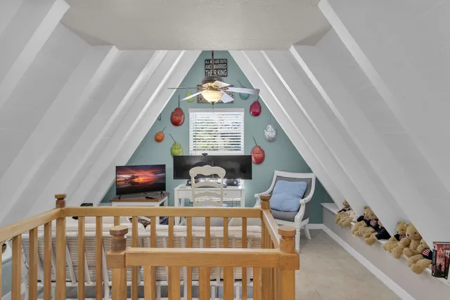 a view of porch with furniture and toys