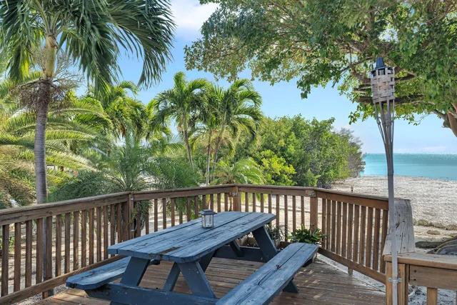 a view of a wooden deck with a bench
