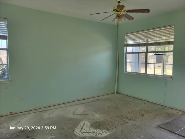 a view of an empty room and window