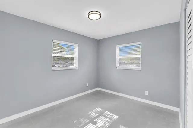 an empty room with a window