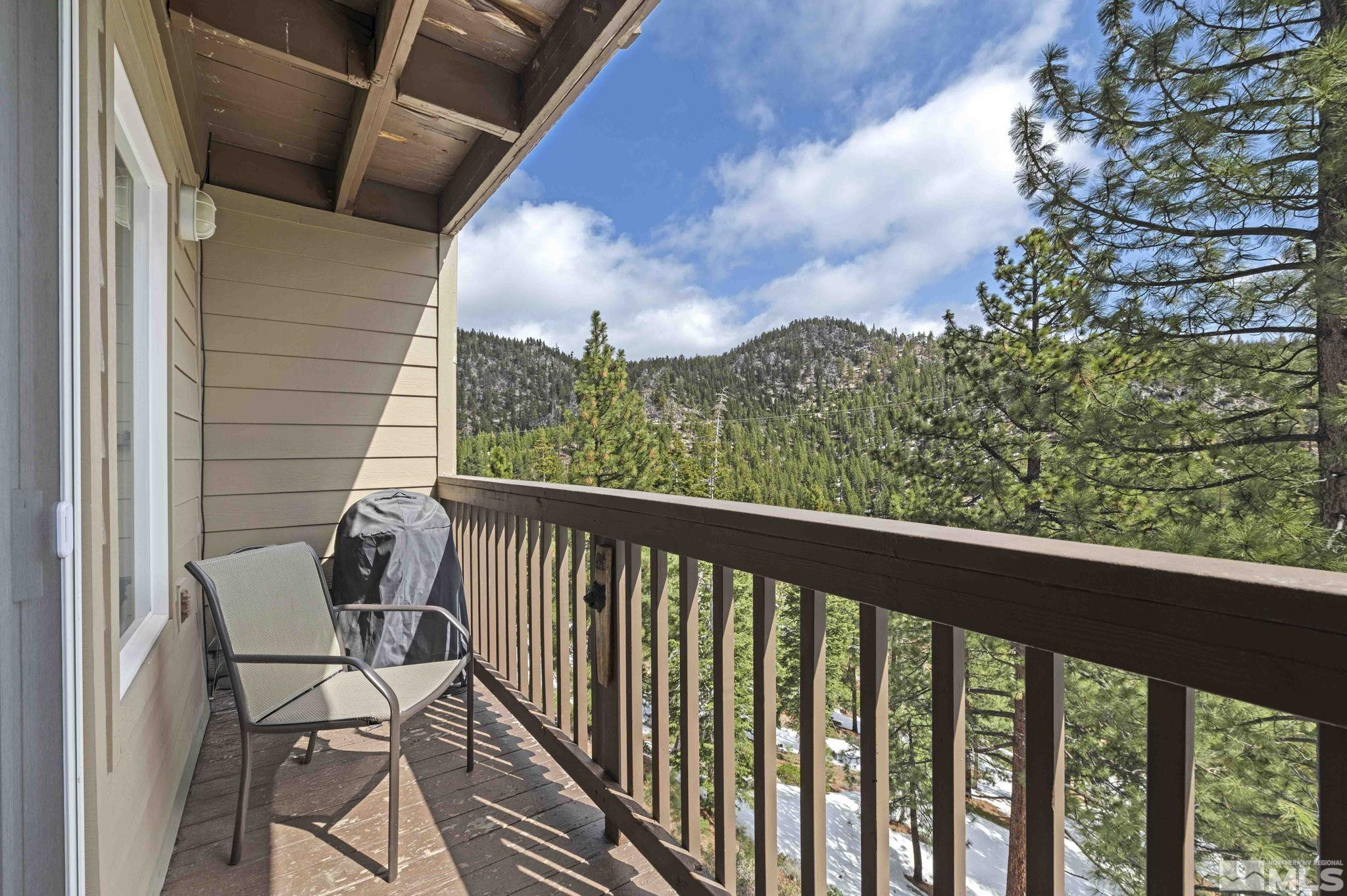 115 Tramway Drive, Unit 2 Stateline, NV 89449 - Photo 9 of 22 a view of a balcony with furniture
