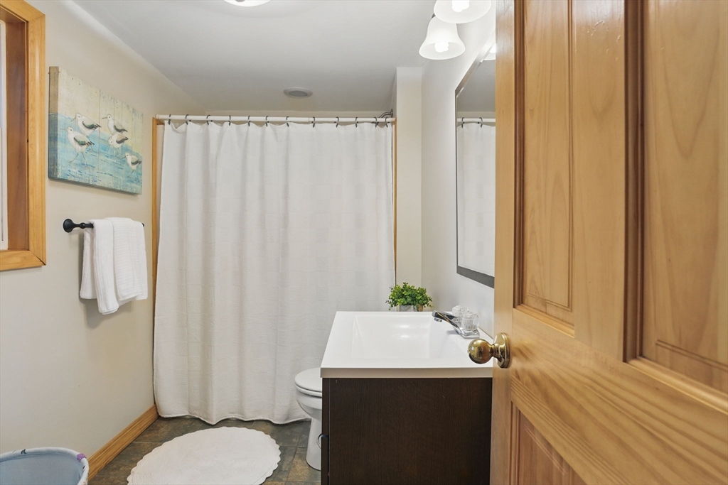 15 Log Cabin Road Ashburnham, MA 01430 - Photo 19 of 24 a bathroom with a sink toilet and shower