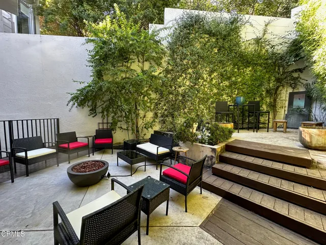a kitchen with stainless steel appliances granite countertop a stove and a sink