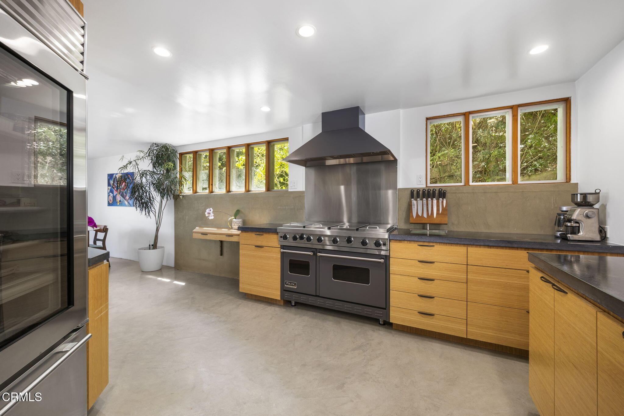 3551 Dixie Canyon Place Los Angeles, CA 91423 - Photo 2 of 47 a kitchen with stainless steel appliances granite countertop a stove and a sink
