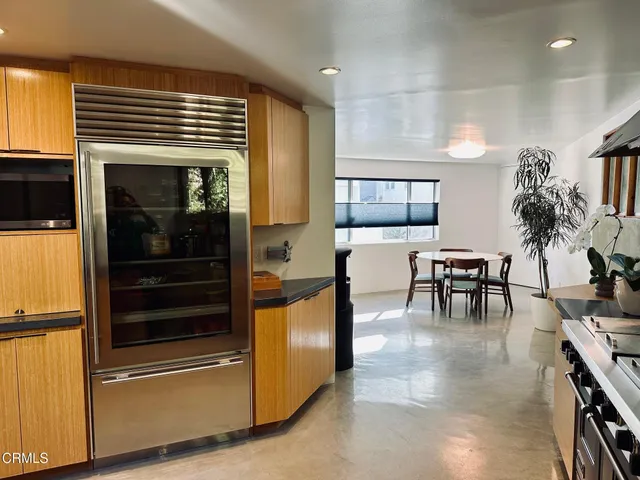 a bed room with a bed and a window