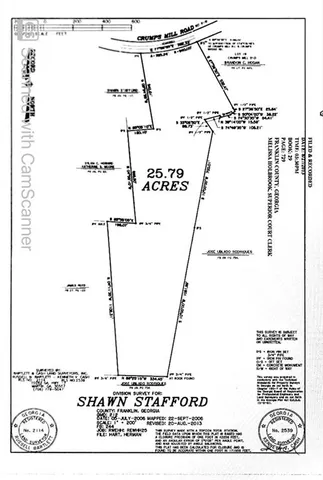 a view of a field with an outdoor space