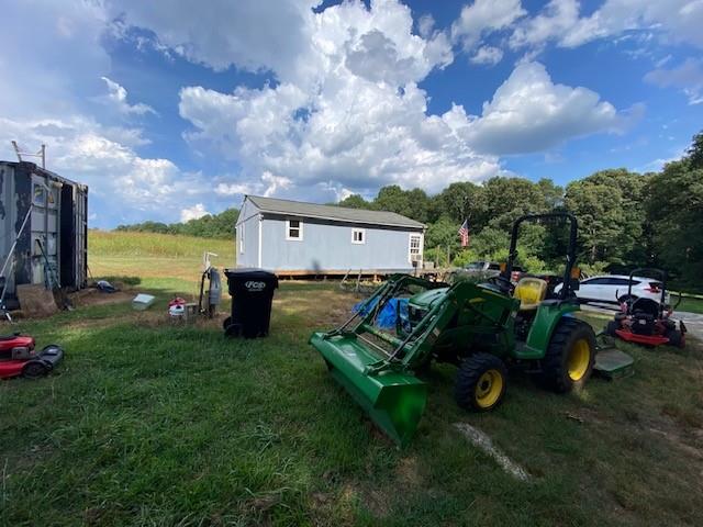 695 Crump Mill Road Martin, GA 30557 - Photo 26 of 26 a view of a garden with lawn chairs